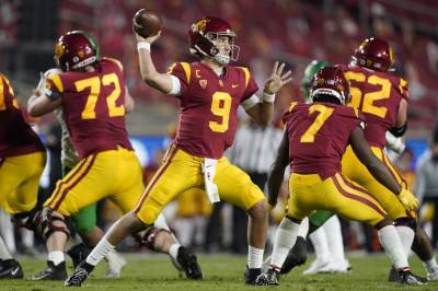 Oregon holds off USC late, grabs Pac-12 title with 31-24 win - clickorlando.com - Los Angeles - state California - state Oregon - county Brown