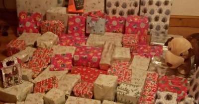 Young mum shamed on social media for sharing daughter's Christmas present pile - dailyrecord.co.uk - city Manchester