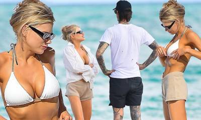 Charlotte McKinney puts on a busty display in a bikini top as she enjoys a day at the beach in Miami - dailymail.co.uk - county Miami - Charlotte - city Charlotte - city Mckinney