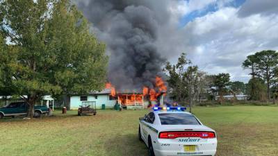 PHOTOS: Fire engulfs home in Mims - clickorlando.com