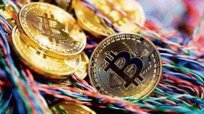 Bitcoin slumps 6% as new Covid-19 strain upsets wider markets - livemint.com - India - Britain