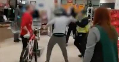 Shocked Morrisons shoppers watch as security guards and youths clash ‘over bike’ - dailystar.co.uk - city Birmingham