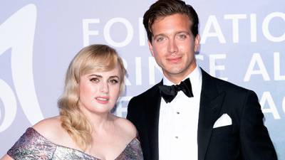 Rebel Wilson - Jacob Busch - Rebel Wilson’s 5 Most Romantic Moments With BF Jacob Busch: Kissing On Winter Vacation More - hollywoodlife.com