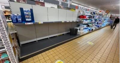 Supermarket shelves empty as panic-buyers hit shops ahead of Christmas lockdown - dailystar.co.uk - Britain - France - city Manchester