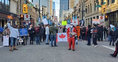 Mark Neufeld - 5 charged following weekend anti-mask rally in Calgary - globalnews.ca