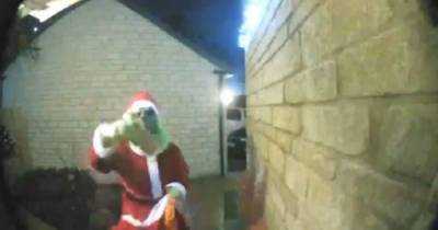 Mysterious 'Grinch' caught delivering presents to neighbours on doorbell cam - dailystar.co.uk - county Cooper - city Santa