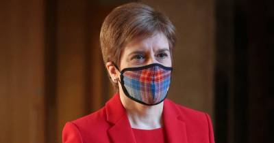 Nicola Sturgeon apologises after being caught chatting to pensioners in pub without face mask - dailyrecord.co.uk