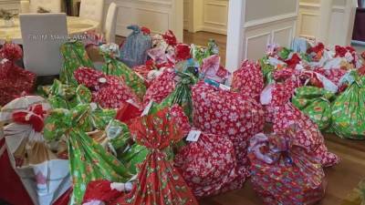 Employees at local company team up to provide Christmas gifts for children in need - fox29.com - city Santa
