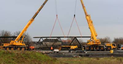Bridge to nowhere being split into sections and carted off for tests as timetable sunk on Scots river project - dailyrecord.co.uk - Scotland