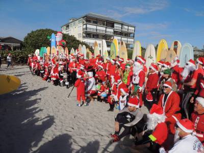Christmas Eve - Surfing Santas scales back annual Christmas Eve event during coronavirus pandemic - clickorlando.com - state Florida - city Santas
