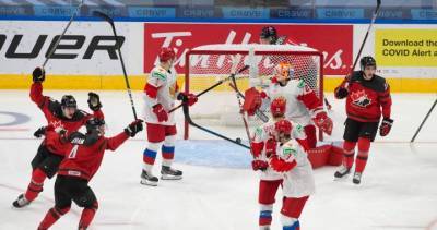 Captain Kirby Dach leaves game as Canada beats Russia in pre-tournament game ahead of world juniors - globalnews.ca - Canada - Russia - city Chicago