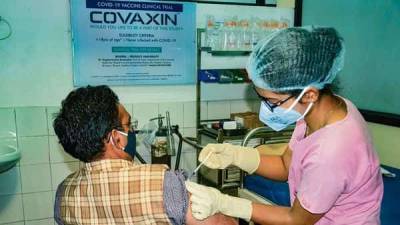 India's first COVID-19 vaccine can offer protection against new strain of virus, says drugmaker - livemint.com - India