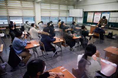 Asia Today: S. Korean students take exams amid viral spike - clickorlando.com