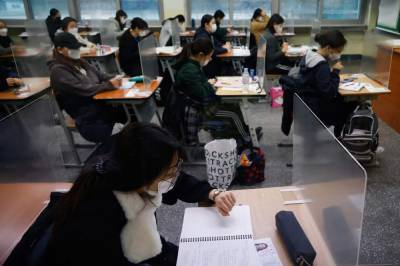 The Latest: Young S. Koreans taking crucial university exam - clickorlando.com