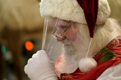 Ho, ho — Whoa! Coronavirus keeping most Santas at a distance - clickorlando.com
