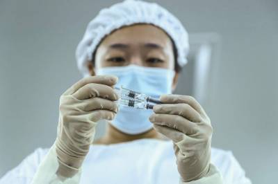 China gives conditional approval to Sinopharm vaccine - clickorlando.com - China - city Beijing