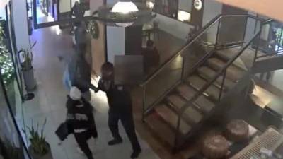 NYPD releases video of woman tackling boy over phone in hotel lobby - fox29.com - New York