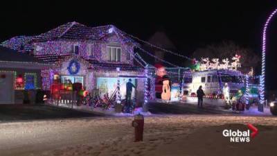 National Lampoon’s Christmas Vacation-themed home with 34,000 lights inspires holiday spirit in Stony Plain - globalnews.ca