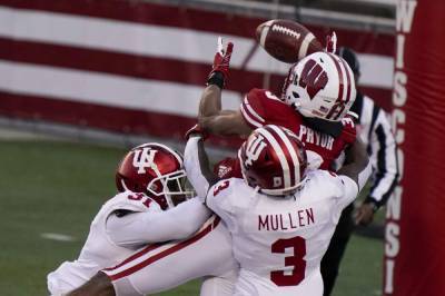 Tuttle, D lift No. 10 Indiana past No. 18 Wisconsin 14-6 - clickorlando.com - state Indiana - county Taylor - Madison, state Wisconsin - state Wisconsin - county Jack