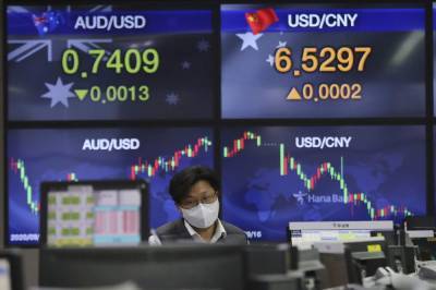 Asian stocks follow Wall Street lower amid virus worries - clickorlando.com - city Beijing - Usa - city Tokyo - city Seoul - city Shanghai - city Hong Kong