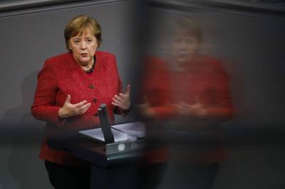 Angela Merkel - Merkel backs tougher virus curbs as German deaths hit record - clickorlando.com - Germany - city Berlin