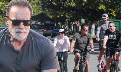 Arnold Schwarzenegger - Ralf Moeller - Arnold Schwarzenegger takes bike ride with kids Christina and Patrick and old pal Ralf Moeller - dailymail.co.uk - Usa - Los Angeles - state California - city Los Angeles