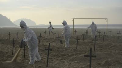 Covid-19: Brazil's death toll now second highest in the world at 41.828 - rte.ie - Britain - Brazil