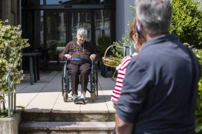 AP PHOTOS: Nursing home residents allowed comfort of family - clickorlando.com - Italy