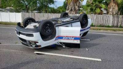 PHOTOS: Police car flips over after chase in Daytona Beach - clickorlando.com - city Daytona Beach