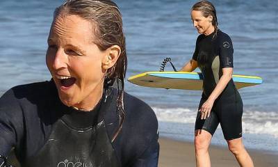 Helen Hunt - Helen Hunt, 56, rocks a wet-suit to catch some waves during morning surf in Malibu - dailymail.co.uk - city Malibu