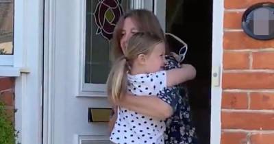 Touching moment girl, 5, hugs her gran as families finally reunited in 'bubbles' - mirror.co.uk - Britain