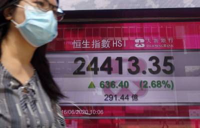 Stephen Innes - Asian stocks follow Wall St higher after Fed ups bond buys - clickorlando.com - South Korea - Japan - Hong Kong - Australia - city Tokyo - city Shanghai