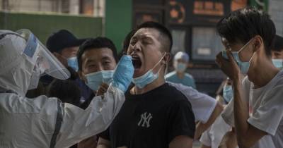Coronavirus infects dozens more in Beijing as flights cut to curb 'second wave' - mirror.co.uk - China - city Beijing
