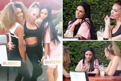 Katie Price - Katie Price ignores social distancing as she hugs Aisleyne Horgan Wallace at Sheesh in Essex with daughter Princess - thesun.co.uk - county Essex