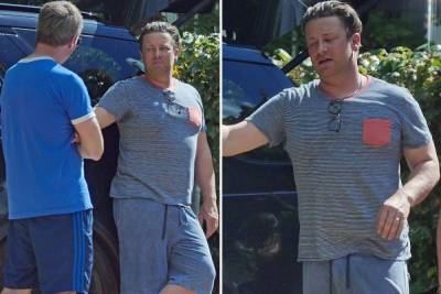 Jamie Oliver - Jamie Oliver, 45, is spotted outside his London home after asking fans to ‘be kind’ about his hair in lockdown - thesun.co.uk
