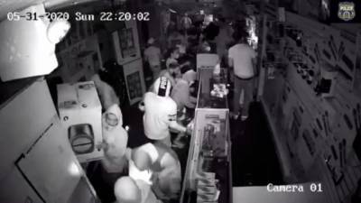 Police release footage of group looting electronics store in Olney, gun among items taken - fox29.com