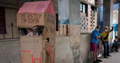 Woman, 82, wears full-body cardboard shield to protect herself from coronavirus - dailystar.co.uk - Usa - Cuba - city Havana, Cuba