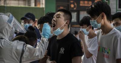 'Alarm bell rung' as China raises coronavirus alert level amid surge of new cases - manchestereveningnews.co.uk - China - city Beijing