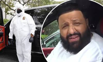 DJ Khaled covers up in a HAZMAT SUIT before getting his root canal fixed at the dentist's office - dailymail.co.uk