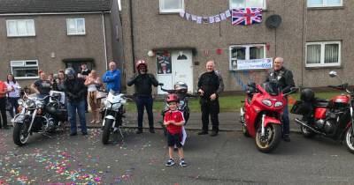 Hero's welcome for four-year-old Renfrew cyclist Harry after he raised thousands for the NHS - dailyrecord.co.uk
