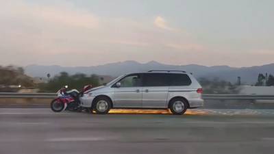 Sparks fly as minivan drags motorcycle along 91 Freeway in Corona - fox29.com - state California