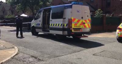 Large police cordon after boy, 13, stabbed on Salford estate - manchestereveningnews.co.uk