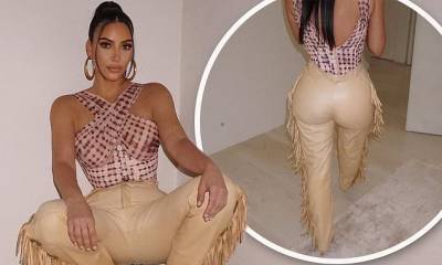 Kim Kardashian - Kim Kardashian wears 'cowgirl' trousers and snakeskin boots - dailymail.co.uk - state Wyoming