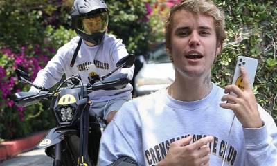 Justin Bieber - Justin Bieber grabs coffee to-go on his custom Drew motorbike and takes a FaceTime call - dailymail.co.uk