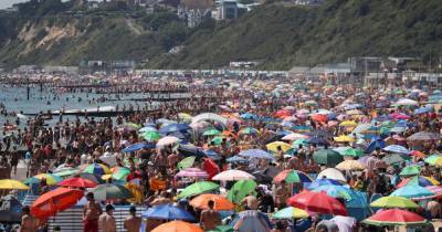 Vikki Slade - Bournemouth beach 'major incident' declared as heatwave crowds branded 'appalling' - mirror.co.uk - city Sandbank