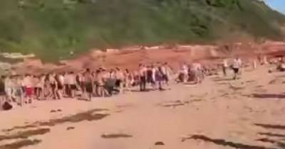 Mass brawl 'of 200 youths' breaks out at beach as families flee from chaos - dailystar.co.uk