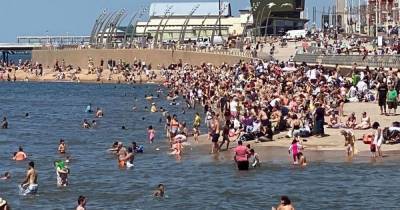 How it looked on Blackpool beach as sunbathers enjoyed hottest day of year - manchestereveningnews.co.uk - Britain