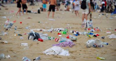 Mountains of rubbish left on Bournemouth beach after chaos on UK's hottest day of year - mirror.co.uk - Britain
