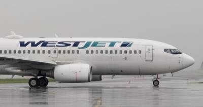 WestJet will end physical distancing on flights starting July 1 - globalnews.ca