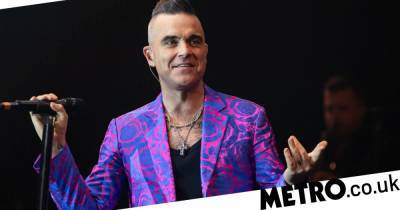 Robbie Williams - Robbie Williams will leave family’s coronavirus vaccine decision to his wife: ‘I’ll have my suspicions and worry and fear’ - metro.co.uk - Britain